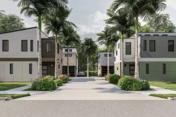 Symmetrical street-level architectural rendering of all four homes in the Six in the City development in College Park, Orlando, showing two modern two-story homes on each side of a central shared driveway with varied tan, gray, and sage green facades, black-framed windows, wood garage doors, lush green lawns, tropical landscaping with ornamental grasses and flowering shrubs, and tall royal palms framing the central axis under a partly cloudy sky